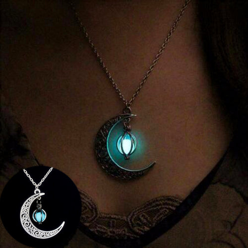 Moonfire glowing crescent pendant necklace worn glowing teal in the dark