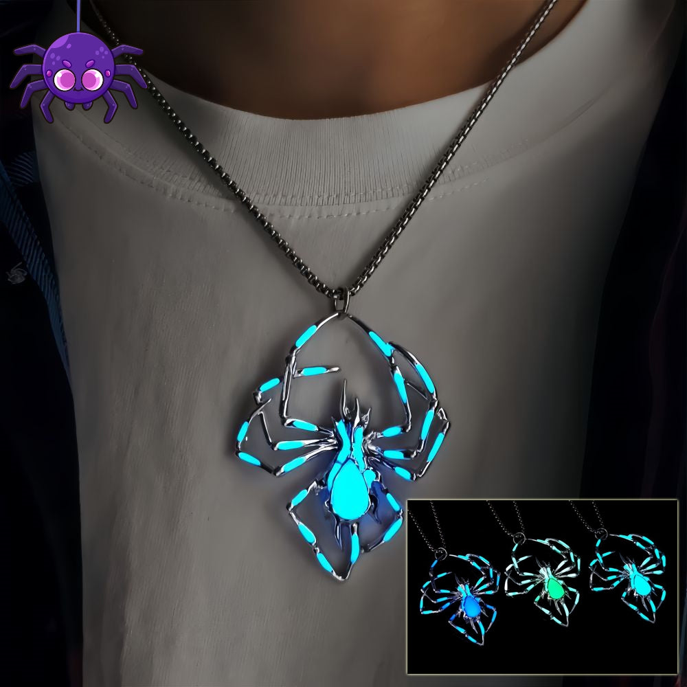 Widow's Glow spider pendant necklace glowing blue in the dark on black velvet - view 2 of 2
